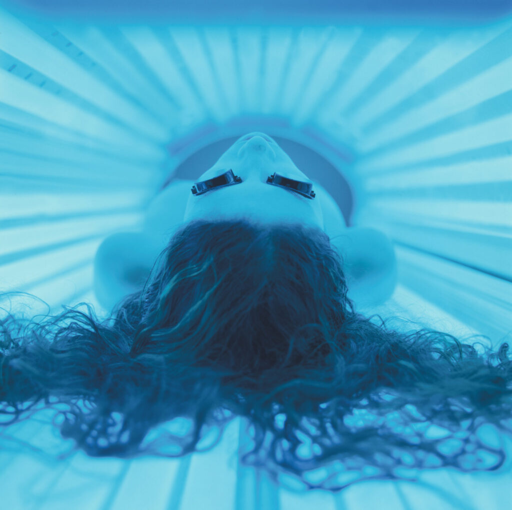 Woman on Tanning Bed